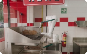 restaurante de pollo frito hecho por Robots